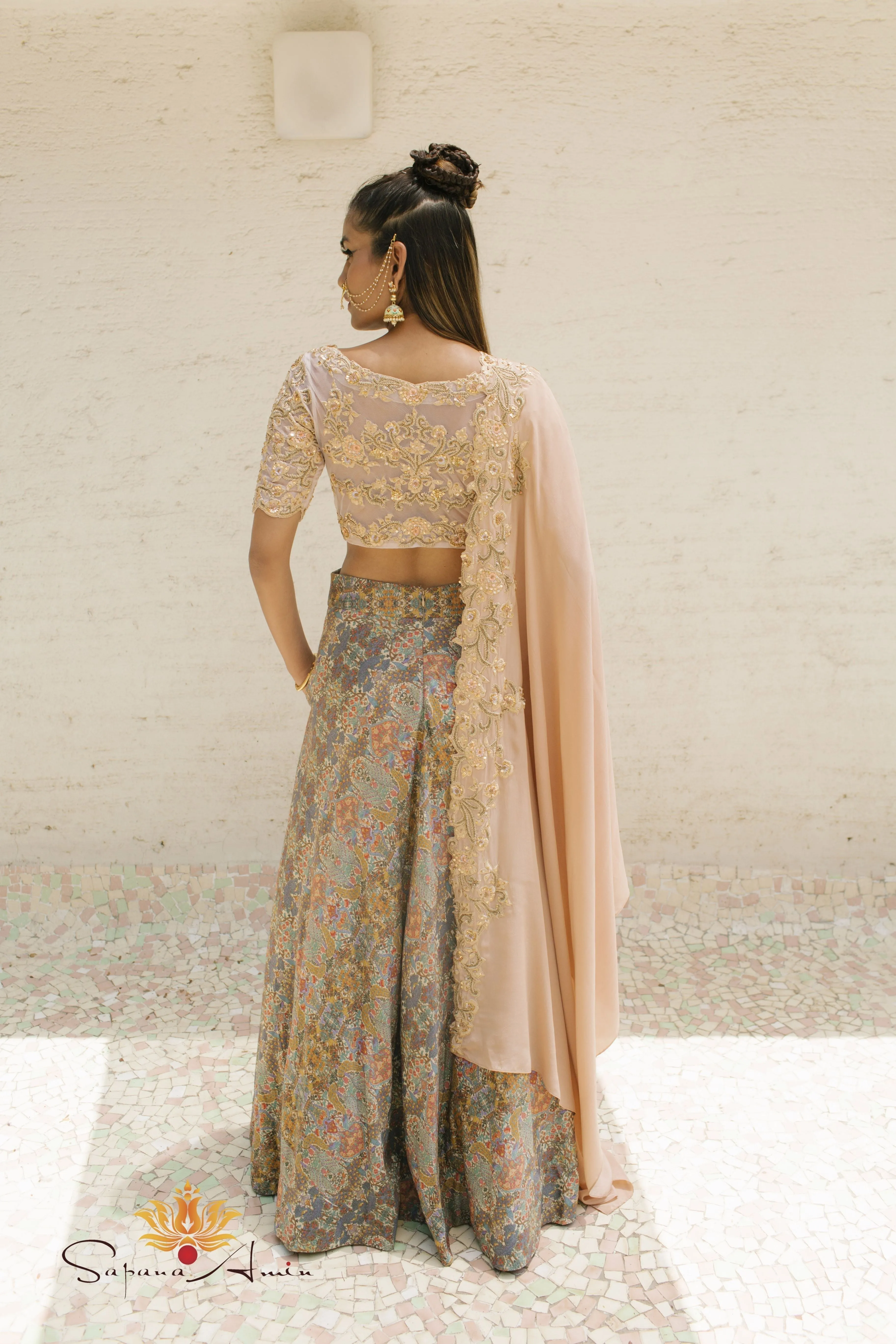 Blush Embroidered Blouse and Peacock Printed Lehenga  Elegant Wear.