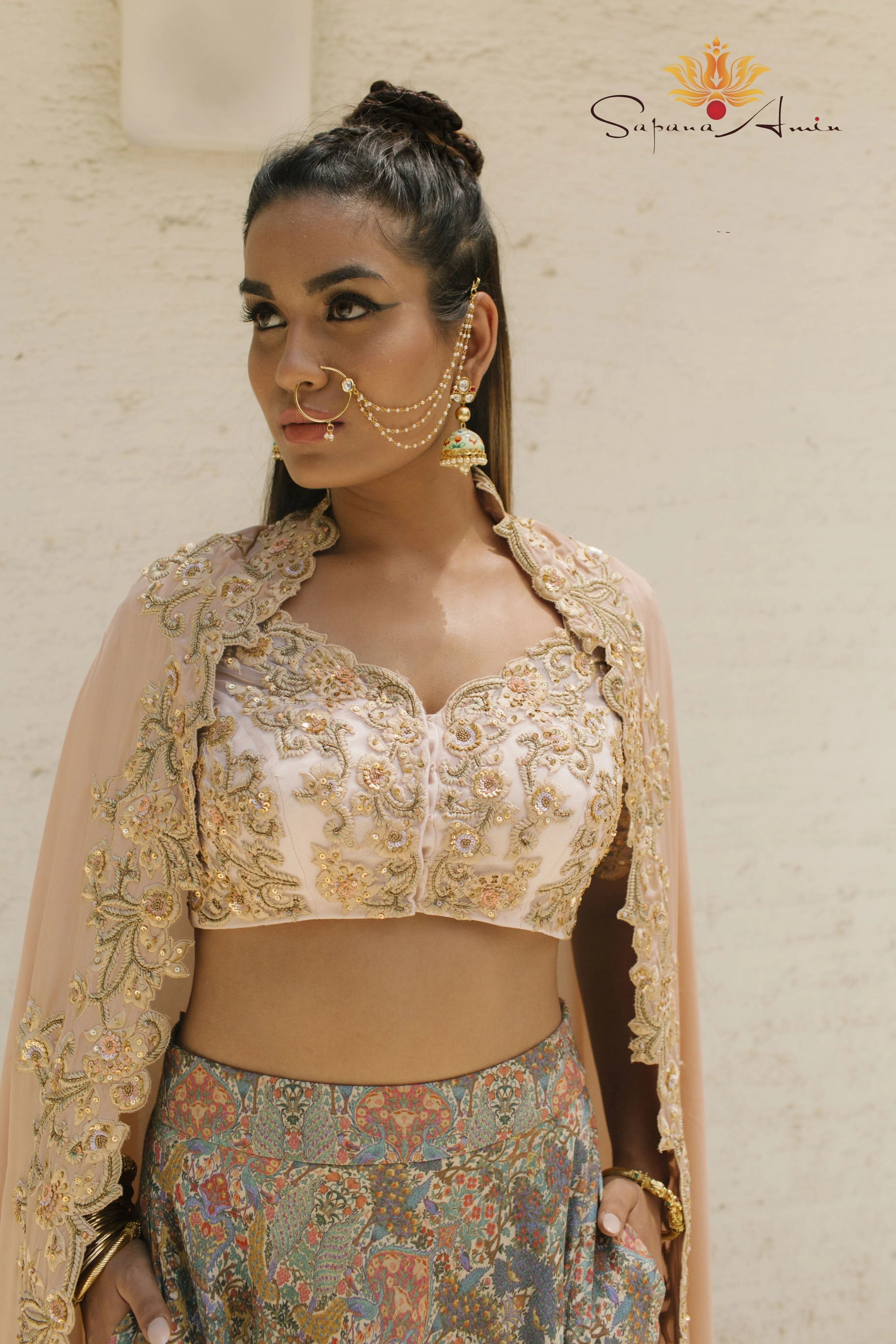 Blush Embroidered Blouse and Peacock Printed Lehenga  Elegant Wear.