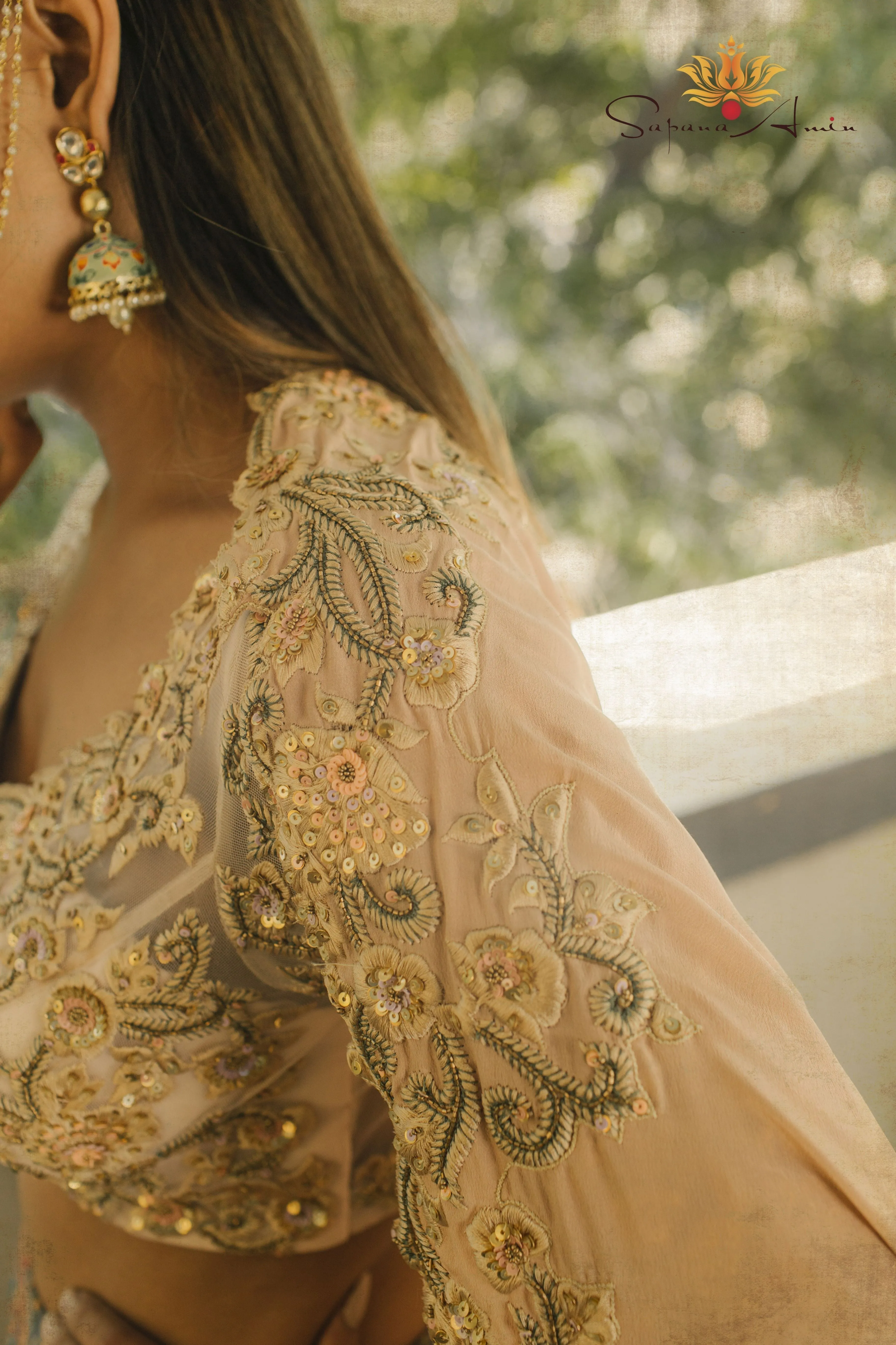 Blush Embroidered Blouse and Peacock Printed Lehenga  Elegant Wear.